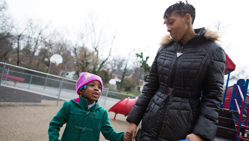 woman and child on playground