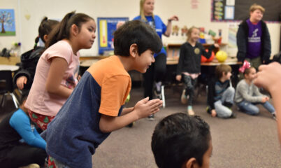 students playing game in classroom