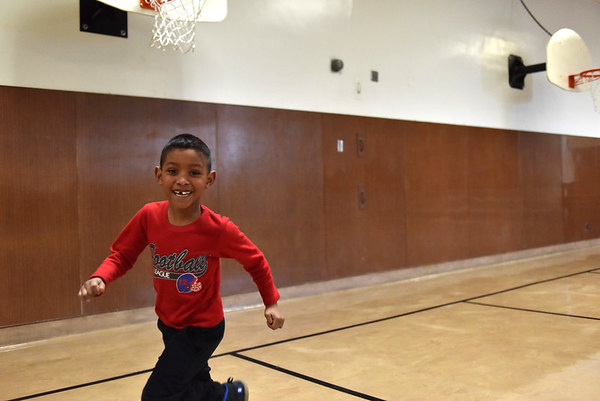 kid running in gym