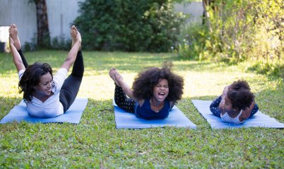 kids and adult doing yoga